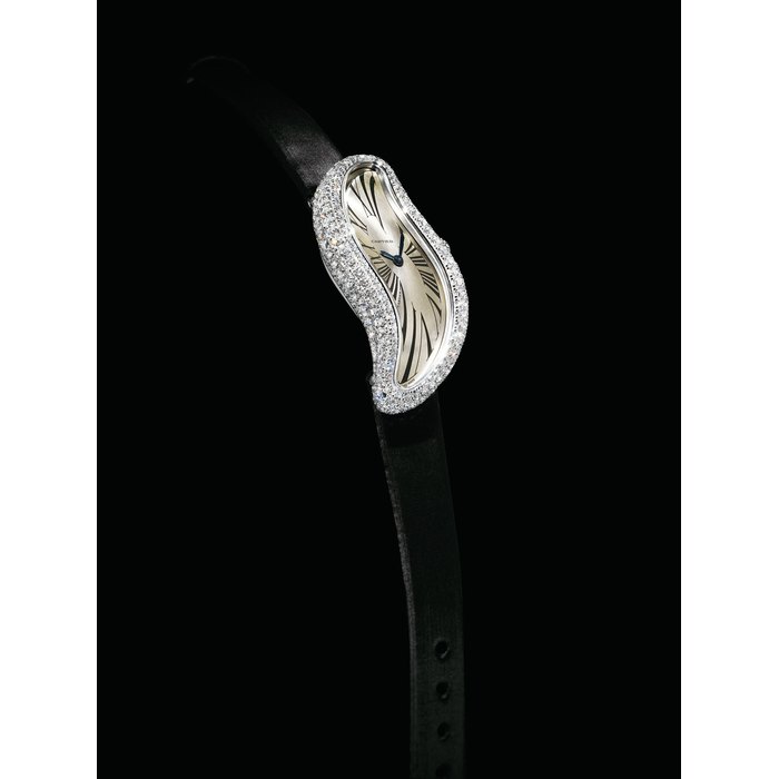CARTIER. A LADY'S FINE AND RARE 18K WHITE GOLD AND DIAMOND-SET ASYMMETRICAL WRISTWATCH SIGNED CARTIER, BAIGNOIRE S MODEL, REF. 3174, CASE NO. 25328NX, CIRCA 2010