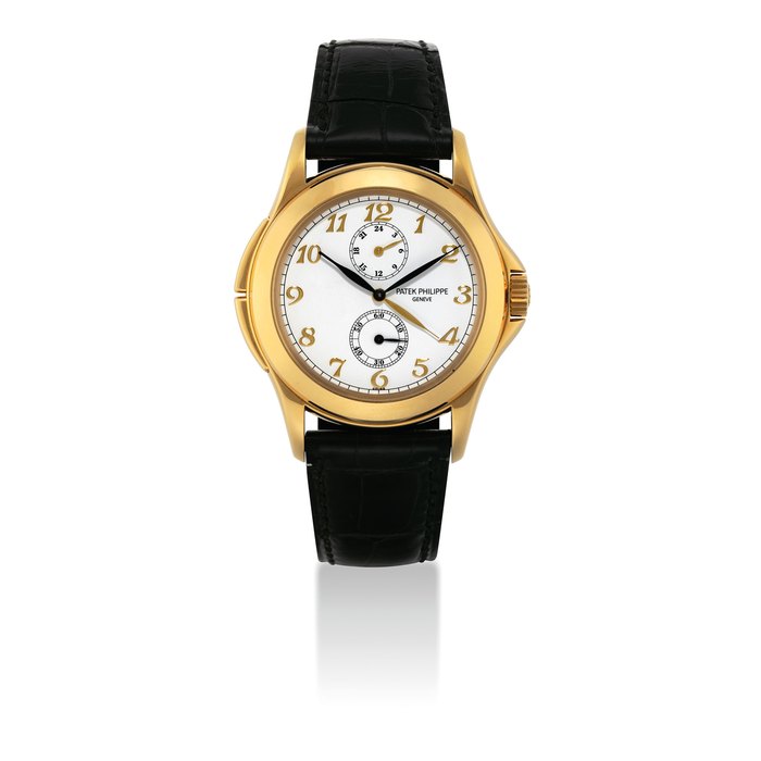 Patek Philippe PATEK PHILIPPE. A FINE AND RARE 18K GOLD DUAL TIME WRISTWATCH WITH 24 HOUR INDICATION, BREGUET NUMERALS, ORIGINAL CERTIFICATE AND BOX SIGNED PATEK PHILIPPE, GENEVE, TRAVEL TIME MODEL, REF. 5134, MOVEMENT NO. 3'085'016, CASE NO. 4'183'015, CIRCA 2005, Price & Market Data