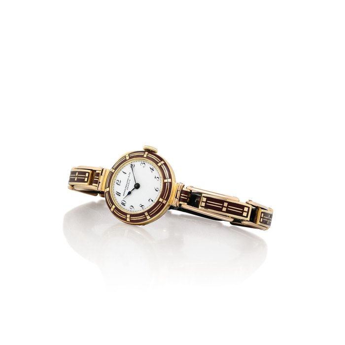 PATEK PHILIPPE. A RARE AND UNUSUAL 18K GOLD AND ENAMEL WRISTWATCH WITH CORRESPONDING LINK BRACELET SIGNED PATEK, PHILIPPE & CIE, GENEVE, MOVEMENT NO. 148'070, CASE NO. 259'276, MANUFACTURED IN 1908