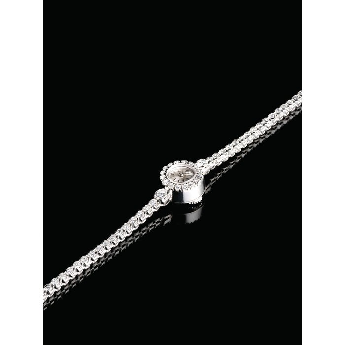 PIAGET. A LADY'S FINE AND RARE 18K WHITE GOLD AND DIAMOND-SET BRACELET WATCH SIGNED PIAGET, REF. 2317, CASE NO. 91'840, CIRCA 1960