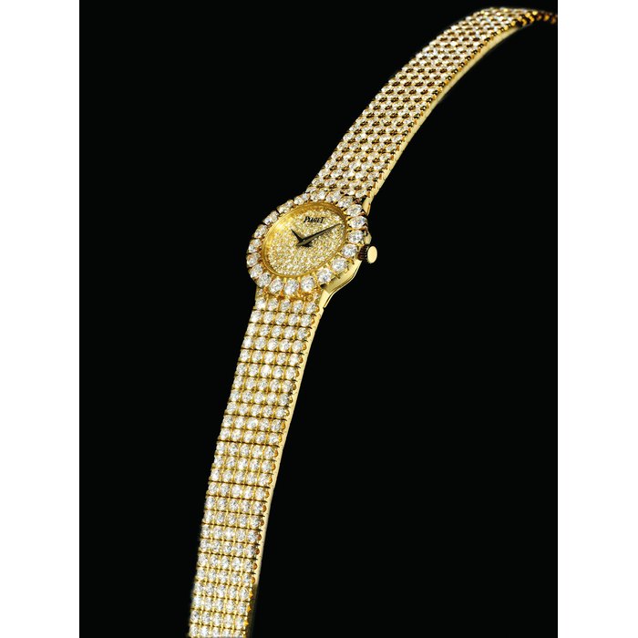 PIAGET. A LADY'S FINE 18K GOLD AND DIAMOND-SET BRACELET WATCH SIGNED PIAGET, REF. 8286 C626, CASE NO. 541'976, CIRCA 1998