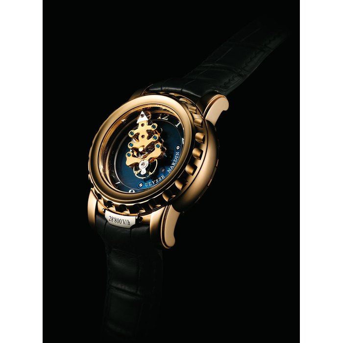 ULYSSE NARDIN. A FINE AND RARE 18K GOLD CARROUSEL TOURBILLON WRISTWATCH WITH SILICIUM ESCAPEMENT SIGNED ULYSSE NARDIN, FREAK MODEL, NO. 033, REF. 026-88, CIRCA 2006