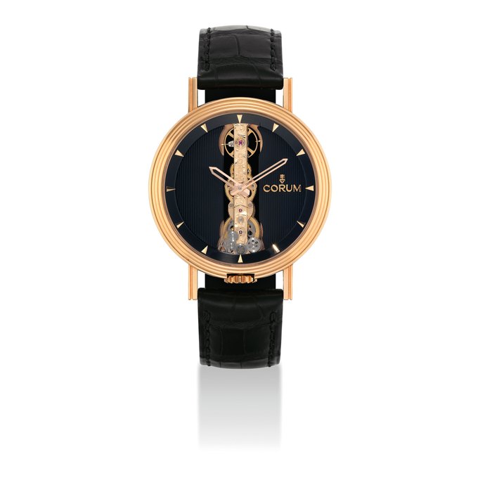 CORUM. A FINE AND RARE 18K PINK GOLD LIMITED EDITION SEMI-SKELETONISED WRISTWATCH WITH LINEAR MOVEMENT SIGNED CORUM, LIMITED EDITION, GOLDEN BRIDGE MODEL, NO. 74/75, REF. 113.247.55, CASE NO. 05.0057 AND 2'276'735, CIRCA 2012