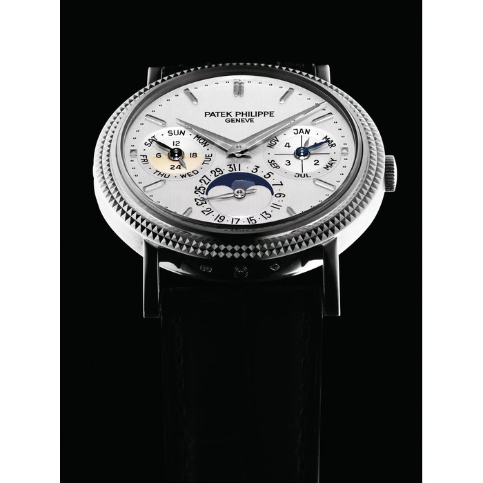 PATEK PHILIPPE. A FINE 18K WHITE GOLD AUTOMATIC PERPETUAL CALENDAR WRISTWATCH WITH MOON PHASES, LEAP YEAR INDICATION, ORIGINAL CERTIFICATE AND BOX SIGNED PATEK PHILIPPE, GENEVE, REF. 5039, MOVEMENT NO. 3'127'855, CASE NO. 4'285'266, CIRCA 2005