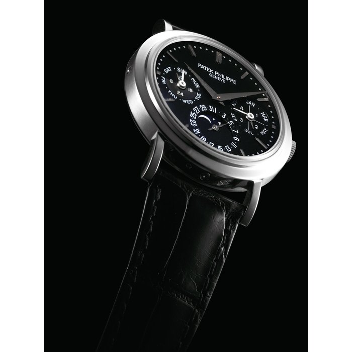 PATEK PHILIPPE. A VERY FINE AND VERY RARE PLATINUM LIMITED EDITION AUTOMATIC PERPETUAL CALENDAR WRISTWATCH WITH MOON PHASES, 24 HOUR AND LEAP YEAR INDICATION, ORIGINAL CERTIFICATE AND BOX, MADE FOR THE 200TH ANNIVERSARY OF BOODLE & DUNTHORNE SIGNED PATEK PHILIPPE, GENEVE, NO. 11/20, REF. 5049, MOVEMENT NO. 3'124'464, CASE NO. 4'065'349, CIRCA 1999
