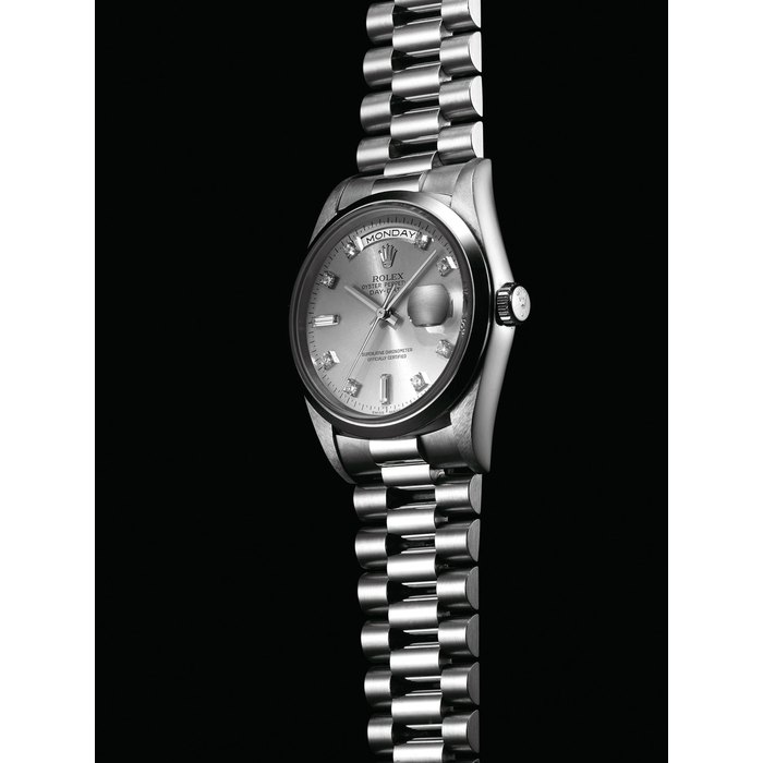 ROLEX. A FINE PLATINUM AND DIAMOND-SET AUTOMATIC WRISTWATCH WITH SWEEP CENTRE SECONDS, DAY, DATE AND BRACELET SIGNED ROLEX, OYSTER PERPETUAL, DAY-DATE, REF. 18206, CASE NO. U702701, CIRCA 1997