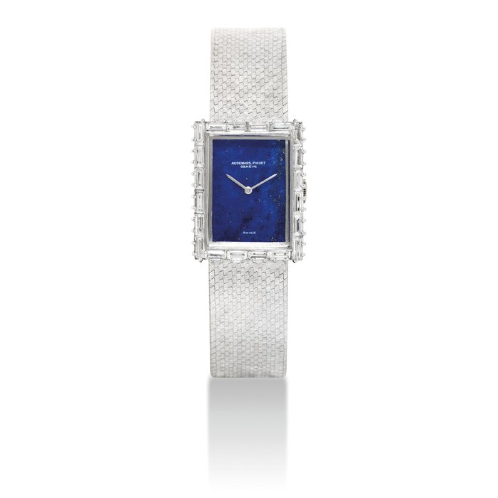 AUDEMARS PIGUET. A LADY'S 18K WHITE GOLD AND DIAMOND-SET RECTANGULAR BRACELET WATCH WITH LAPIS LAZULI DIAL SIGNED AUDEMARS PIGUET, GENEVE, MOVEMENT NO. 166'177, CASE NO. 55'716, CIRCA 1970