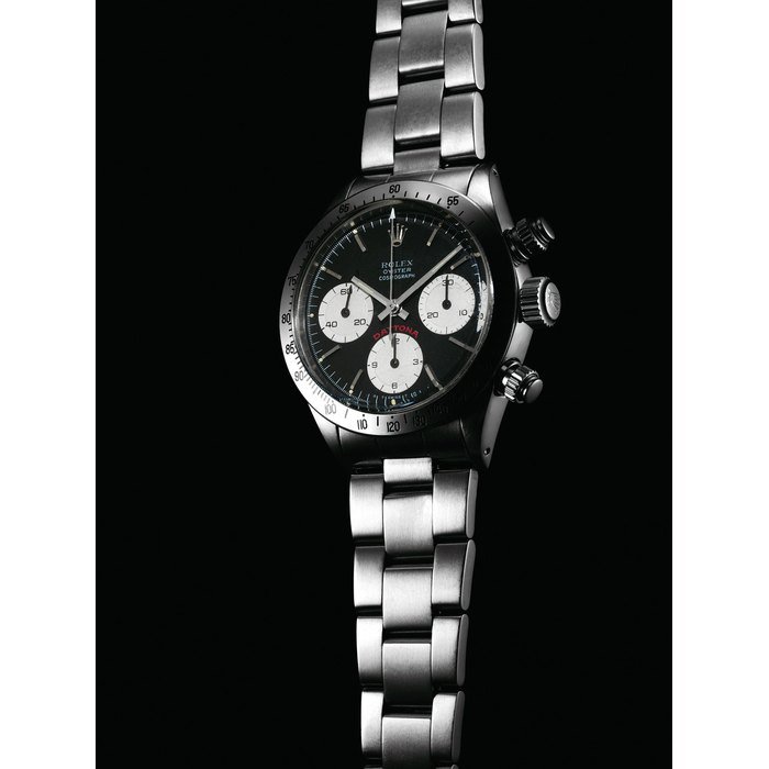 Rolex ROLEX. A FINE, RARE AND ATTRACTIVE STAINLESS STEEL CHRONOGRAPH WRISTWATCH WITH BRACELET, BLACK DIAL, GUARANTEE AND BOX SIGNED ROLEX, OYSTER COSMOGRAPH, DAYTONA MODEL, REF. 6265, CASE NO. 4'138'236, CIRCA 1975 · 6265