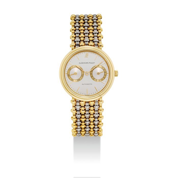 Audemars Piguet AUDEMARS PIGUET. AN 18K TWO-COLOUR GOLD AUTOMATIC BRACELET WATCH WITH DAY AND DATE SIGNED AUDEMARS PIGUET, AUTOMATIC, CASE NO. B87257, CIRCA 1980