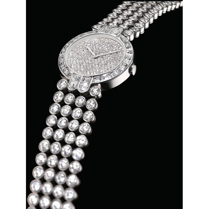 Harry Winston HARRY WINSTON. A FINE AND RARE PLATINUM AND DIAMOND-SET AUTOMATIC BRACELET WATCH SIGNED HARRY WINSTON, CASE NO. 2285, CIRCA 2000, Price & Market Data