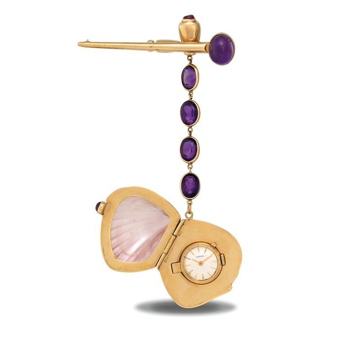 Cartier CARTIER. A RARE 14K GOLD, AMETHYST AND MOTHER-OF-PEARL KEYLESS LEVER WATCH IN THE FORM OF A SHELL SIGNED CARTIER, CIRCA 1960