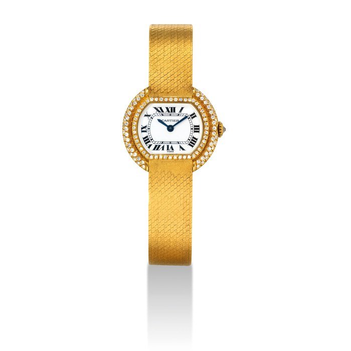 Cartier CARTIER. A LADY'S RARE 18K GOLD AND DIAMOND-SET TONNEAU-SHAPED BRACELET WATCH SIGNED CARTIER, ELLIPSE MODEL, CASE NO. 670'813'180, CIRCA 1980