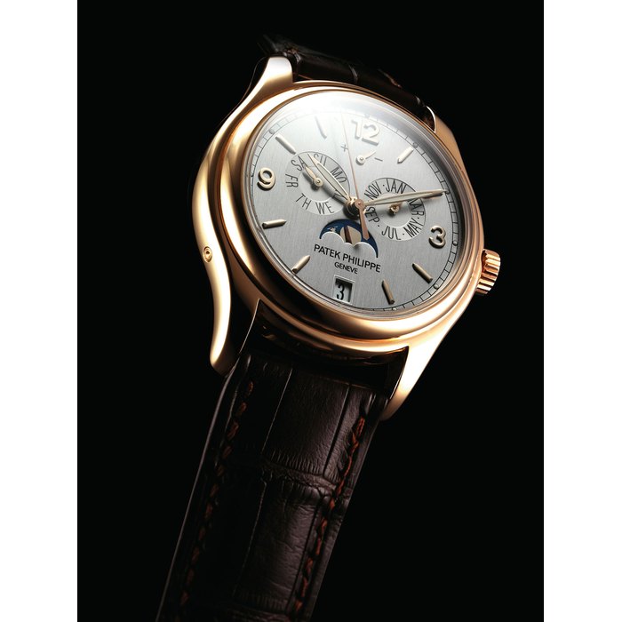 PATEK PHILIPPE. A FINE AND RARE 18K PINK GOLD LIMITED EDITION AUTOMATIC ANNUAL CALENDAR WRISTWATCH WITH SWEEP CENTRE SECONDS, POWER RESERVE, MOON PHASES, SILICON ESCAPE WHEEL, SILINVAR SPIROMAX BALANCE SPRING, ORIGINAL CERTIFICATE AND BOX SIGNED PATEK PHILIPPE, GENEVE, ADVANCED RESEARCH, ANNUAL CALENDAR MODEL, REF. 5350, MOVEMENT NO. 3'686'008, CASE NO. 4'375'140, CIRCA 2007