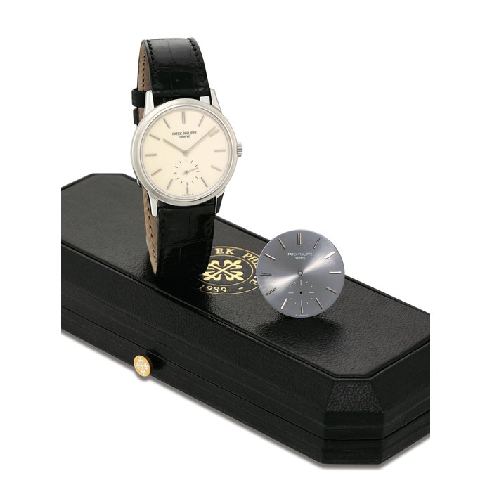 PATEK PHILIPPE. A STAINLESS STEEL SPECIAL EDITION WRISTWATCH, MADE FOR THE JAPANESE MARKET TO COMMEMORATE THE PATEK PHILIPPE 150TH ANNIVERSARY, ACCOMPANIED BY AN ADDITIONAL PATEK PHILIPPE DIAL SIGNED PATEK PHILIPPE, GENEVE, REF. 3718, MOVEMENT NO. 1'815'311, CASE NO. 2'856'984, MANUFACTURED IN 1988