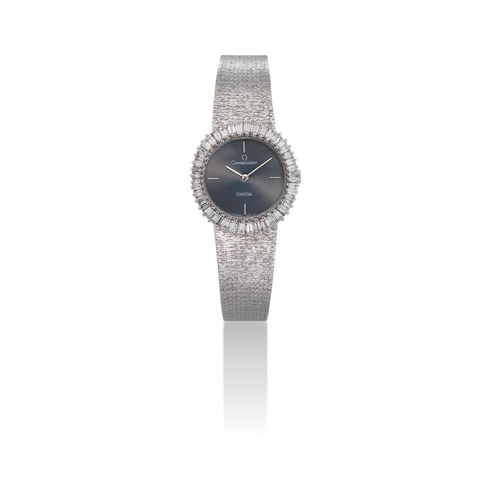 Omega OMEGA. A LADY'S 18K WHITE GOLD AND DIAMOND-SET BRACELET WATCH SIGNED OMEGA, CONSTELLATION MODEL, MOVEMENT NO. 25'909'145, CASE NO. 701'822, CIRCA 1970