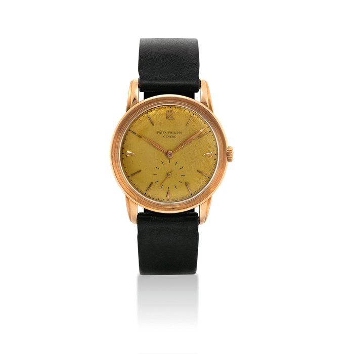 PATEK PHILIPPE. AN 18K PINK GOLD WRISTWATCH WITH CHAMPAGNE DIAL SIGNED PATEK PHILIPPE, GENEVE, REF. 2452, MOVEMENT NO. 954'389, CASE NO. 659'534, MANUFACTURED IN 1950
