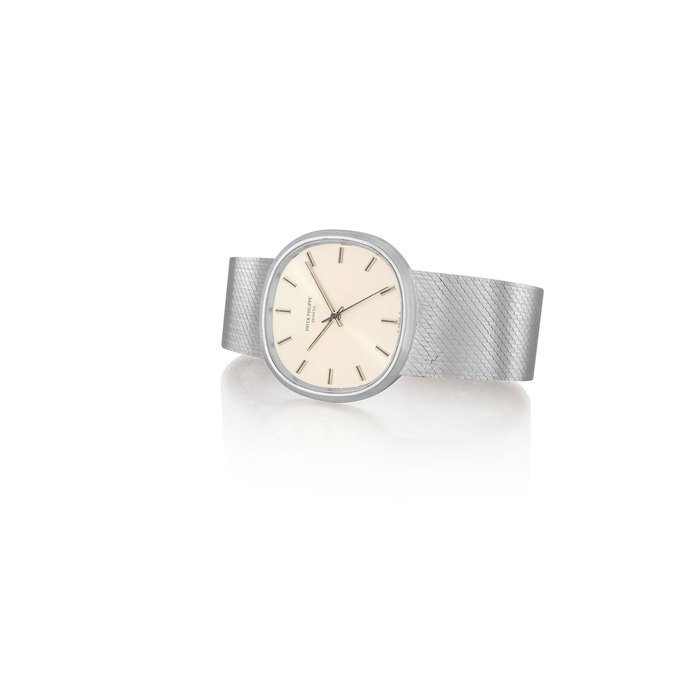 PATEK PHILIPPE. A FINE 18K WHITE GOLD CUSHION-SHAPED AUTOMATIC BRACELET WATCH WITH SWEEP CENTRE SECONDS SIGNED PATEK PHILIPPE, GENEVE, REF. 3586/1, MOVEMENT NO. 1'184'798, CASE NO. 2'721'049, MANUFACTURED IN 1972