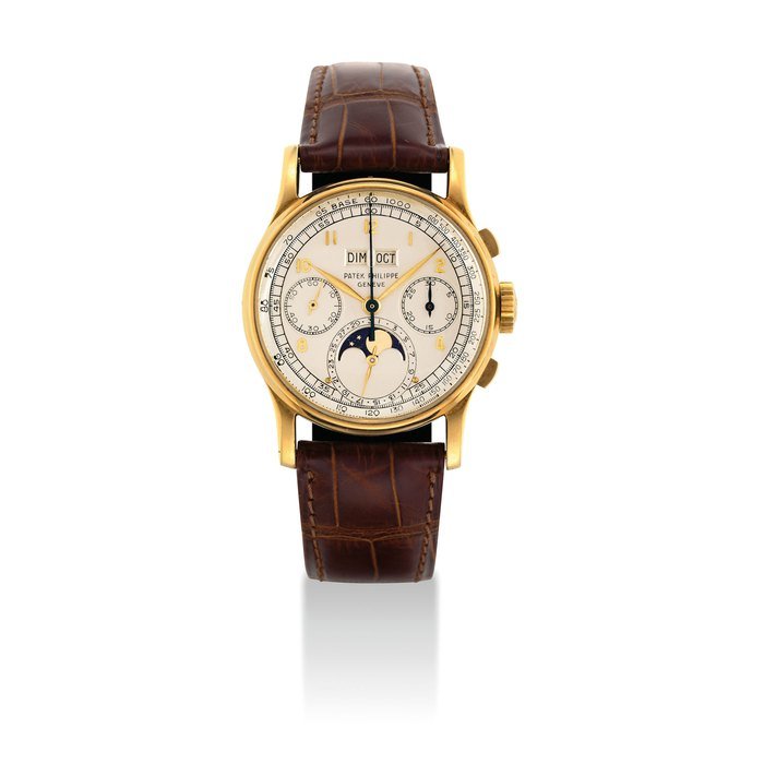 Patek Philippe PATEK PHILIPPE. A VERY FINE AND RARE 18K GOLD PERPETUAL CALENDAR CHRONOGRAPH WRISTWATCH WITH MOON PHASES SIGNED PATEK PHILIPPE, GENEVE, REF. 1518, MOVEMENT NO. 863'177, CASE NO. 632'516, MANUFACTURED IN 1943 · 1518
