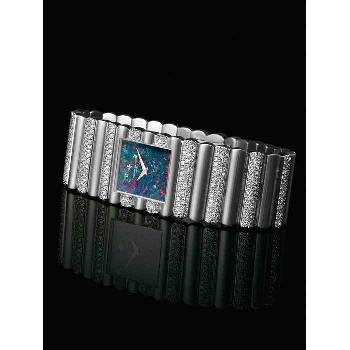 Vacheron Constantin VACHERON CONSTANTIN. A VERY RARE AND HEAVY 18K WHITE GOLD AND DIAMOND-SET RECTANGULAR BRACELET WATCH WITH OPAL DIAL SIGNED VACHERON CONSTANTIN, GENEVE, REF. 33030 P, MOVEMENT NO. 667'877, CASE NO. 515'476, CIRCA 1970