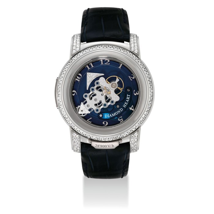 ULYSSE NARDIN. A VERY FINE AND RARE PLATINUM AND DIAMOND-SET LIMITED EDITION CARROUSEL TOURBILLON WRISTWATCH WITH DUAL DIRECT ESCAPEMENT AND 7 DAY POWER RESERVE SIGNED ULYSSE NARDIN, FREAK 28'800 V/H DIAMOND HEART MODEL, NO. 32/99, REF. 029-80, CIRCA 2006