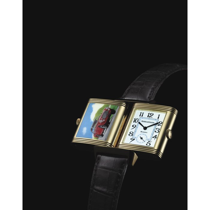 Jaeger-Lecoultre JAEGER-LECOULTRE. A FINE AND RARE 18K GOLD AND ENAMEL RECTANGULAR REVERSIBLE WRISTWATCH SIGNED JAEGER-LECOULTRE, REVERSO GRANDE TAILLE ENAMEL FERRARI MODEL, REF. 276.1.62, MOVEMENT NO. 3'069'107, CASE NO. 2'074'550, MANUFACTURED IN 2003