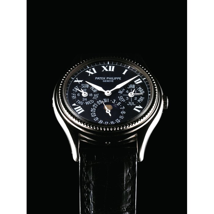 PATEK PHILIPPE. A FINE AND RARE 18K WHITE GOLD LIMITED EDITION AUTOMATIC PERPETUAL CALENDAR WRISTWATCH WITH MOON PHASES, LEAP YEAR AND 24 HOUR INDICATION AND ORIGINAL CERTIFICATE SIGNED PATEK PHILIPPE, GENEVE, REF. 5038, MOVEMENT NO. 775'924, CASE NO. 4'004'848, CIRCA 1996