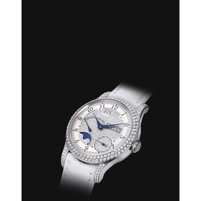 F.P. JOURNE. A LADY'S FINE AND RARE PLATINUM AND DIAMOND-SET AUTOMATIC WRISTWATCH WITH POWER RESERVE, MOON PHASES AND DATE SIGNED F.P. JOURNE, INVENIT ET FECIT, OCTA DEVINE MODEL, NO. 014-04D, CIRCA 2007