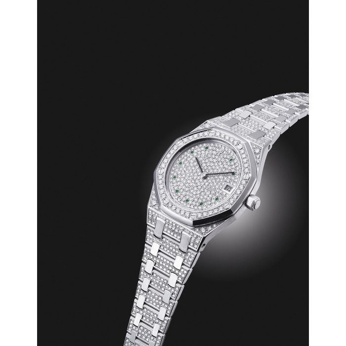 Audemars Piguet AUDEMARS PIGUET. A VERY FINE AND RARE 18K WHITE GOLD, DIAMOND AND EMERALD-SET AUTOMATIC WRISTWATCH WITH DATE AND BRACELET SIGNED AUDEMARS PIGUET, ROYAL OAK MODEL, CASE NOS. 091 AND D60892, CIRCA 2000