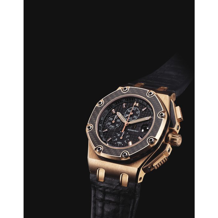 Audemars Piguet AUDEMARS PIGUET. A FINE AND RARE 18K PINK GOLD AND CARBON FIBRE LIMITED EDITION AUTOMATIC CHRONOGRAPH WRISTWATCH WITH DATE SIGNED AUDEMARS PIGUET, ROYAL OAK OFFSHORE JUAN PABLO MONTOYA MODEL, NO. 467/500, REF. 26030RO.OO.D001IN.01, MOVEMENT NO. 582'611, CIRCA 2003