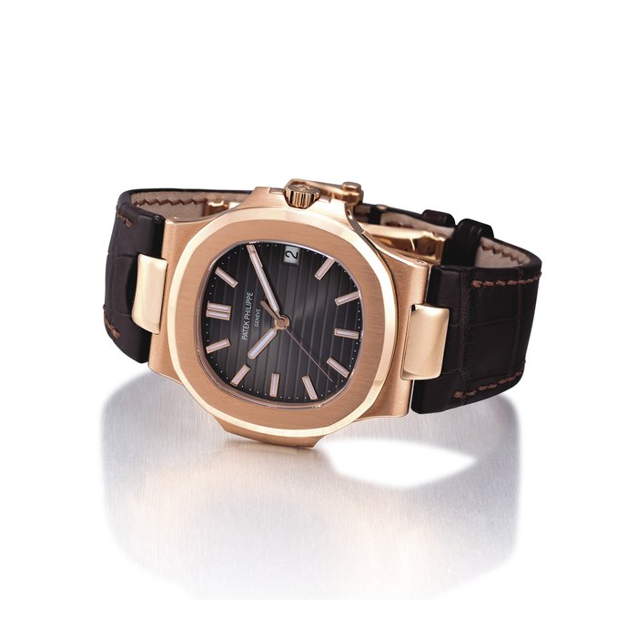PATEK PHILIPPE. A FINE 18K PINK GOLD AUTOMATIC WRISTWATCH WITH SWEEP CENTRE SECONDS, DATE, ORIGINAL CERTIFICATE AND BOX SIGNED PATEK PHILIPPE, GENEVE, REF. 5711, MOVEMENT NO. 3'649'066, CASE NO. 4'473'786, CIRCA 2009