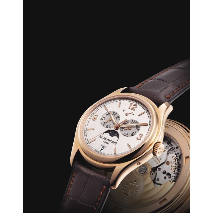 PATEK PHILIPPE. A FINE AND RARE 18K PINK GOLD LIMITED EDITION AUTOMATIC ANNUAL CALENDAR WRISTWATCH WITH SWEEP CENTRE SECONDS, POWER RESERVE, MOON PHASES, SILICON ESCAPE WHEEL, SILINVAR SPIROMAX BALANCE SPRING, ORIGINAL CERTIFICATE AND BOX SIGNED PATEK PHILIPPE, GENEVE, ADVANCED RESEARCH, ANNUAL CALENDAR MODEL, REF. 5350, MOVEMENT NO. 3'686'133, CASE NO. 4'375'068, CIRCA 2007
