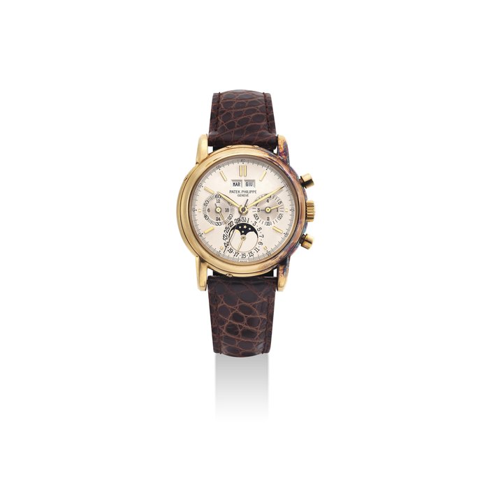PATEK PHILIPPE. A VERY FINE AND RARE 18K GOLD PERPETUAL CALENDAR CHRONGRAPH WRISTWATCH WITH MOON PHASES, 24 HOUR AND LEAP YEAR INDICATION SIGNED PATEK PHILIPPE, GENEVE, REF. 3970, MOVEMENT NO. 875'197, CASE NO. 2'840'128, MANUFACTURED IN 1988