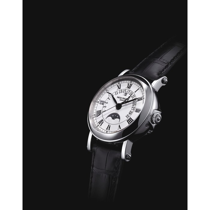 PATEK PHILIPPE. A FINE AND RARE PLATINUM AUTOMATIC PERPETUAL CALENDAR WRISTWATCH WITH SWEEP CENTRE SECONDS, RETROGRADE DATE, MOON PHASES, LEAP YEAR INDICATION, ORIGINAL CERTIFICATE AND BOX SIGNED PATEK PHILIPPE, GENEVE, REE. 5059, MOVEMENT NO. 3'410'580, CASE NO. 4'365'476, CIRCA 2007