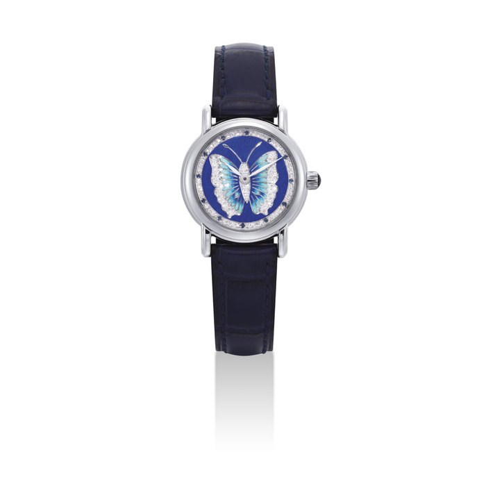 ULYSSE NARDIN. A LADY'S 18K WHITE GOLD, DIAMOND AND SAPPHIRE-SET AUTOMATIC WRISTWATCH WITH ENAMEL DIAL SIGNED ULYSSE NARDIN, SAN MARCO MODEL, REF. 120-77-9, CASE NO. 26, CIRCA 1998