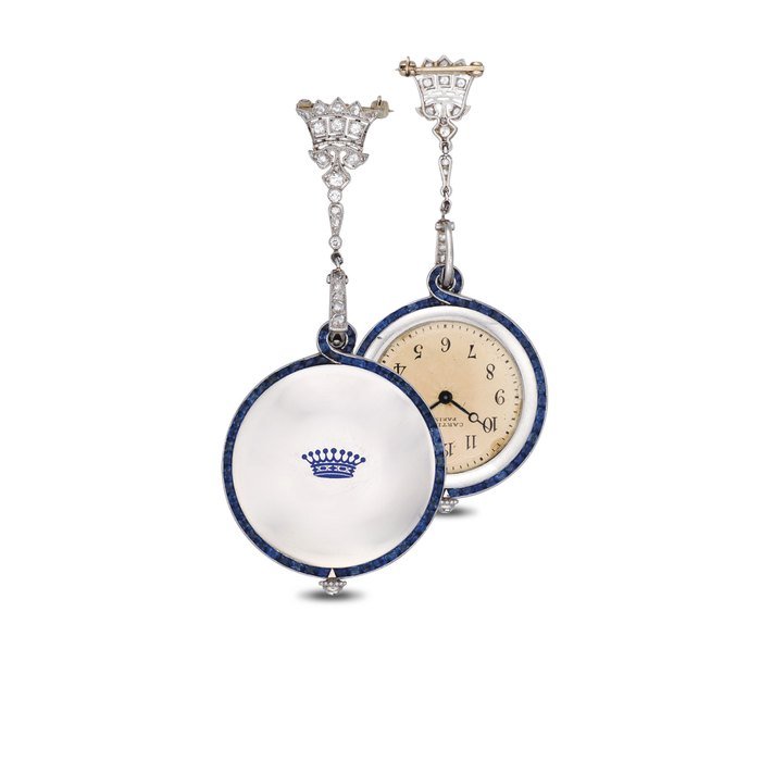Cartier CARTIER. A VERY FINE AND RARE ART DECO PLATINUM, SAPPHIRE AND DIAMOND-SET OPENFACE KEYLESS LEVER PENDANT WATCH WITH CORRESPONDING PLATINUM AND DIAMOND BROOCH SIGNED CARTIER, PARIS, CASE NO. 7323, CIRCA 1920