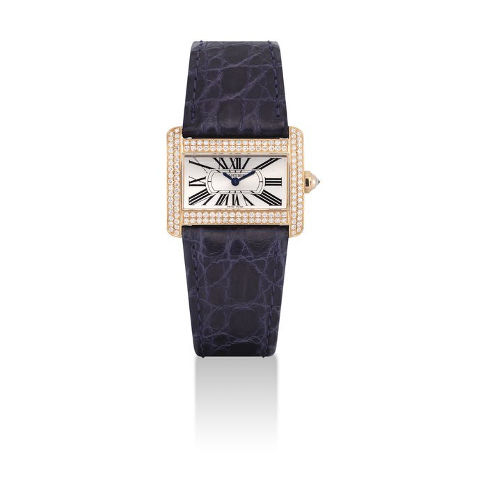 Cartier CARTIER. A LADY'S FINE 18K GOLD AND DIAMOND-SET RECTANGULAR WRISTWATCH SIGNED CARTIER, TANK DIVAN MODEL, REF. 2601, CASE NO. 265906 CE, CIRCA 2003