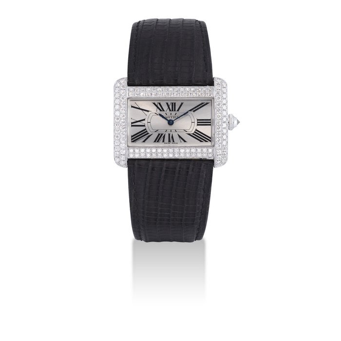 Cartier CARTIER. A LADY'S FINE 18K WHITE GOLD AND DIAMOND-SET RECTANGULAR WRISTWATCH SIGNED CARTIER, TANK DIVAN MODEL, REF. 2614, CASE NO. 274175 CE, CIRCA 2005
