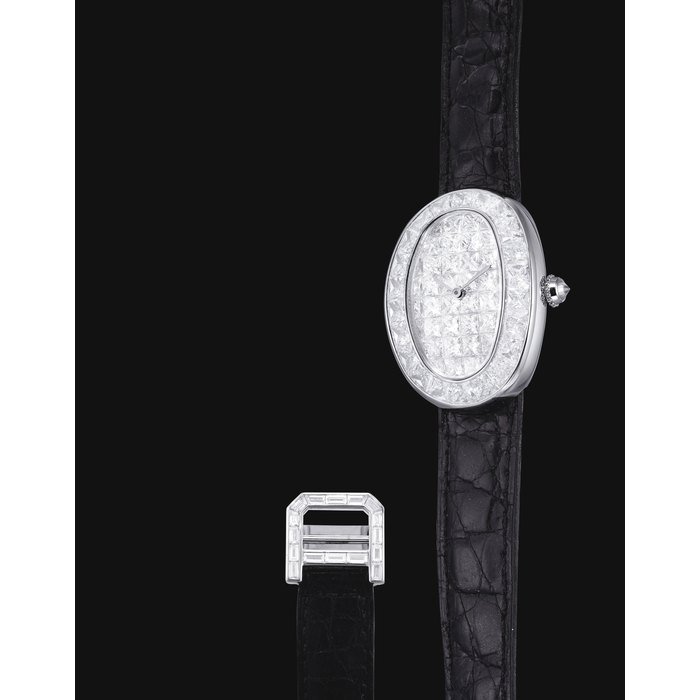 Cartier CARTIER. A LADY'S FINE AND RARE 18K WHITE GOLD AND DIAMOND-SET OVAL WRISTWATCH SIGNED CARTIER, BAIGNOIRE MODEL, CASE NO. 735'477, CIRCA 1998