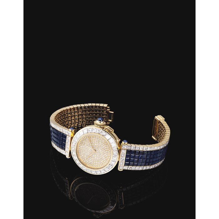 Cartier CARTIER. A VERY IMPRESSIVE AND RARE 18K GOLD, DIAMOND AND SAPPHIRE-SET AUTOMATIC BRACELET WATCH SIGNED CARTIER, PASHA MODEL, NO. 1, CIRCA 2000