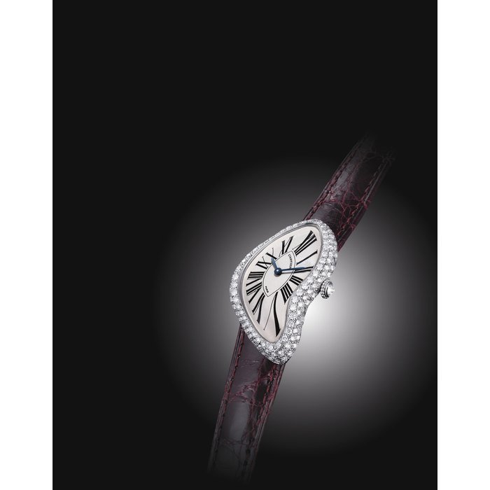 Cartier CARTIER. A LADY'S FINE AND RARE 18K WHITE GOLD AND DIAMOND-SET ASYMMETRICAL WRISTWATCH SIGNED CARTIER, CRASH MODEL, CASE NO. A 114684, CIRCA 2000
