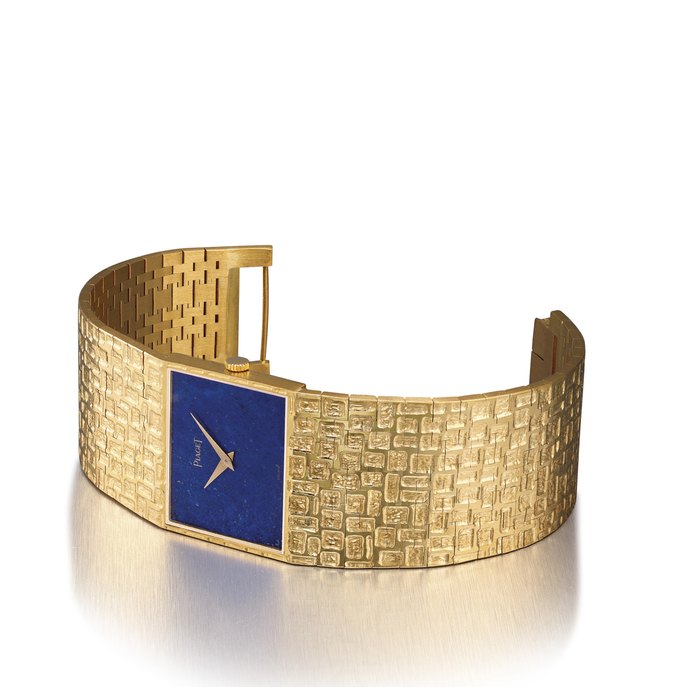 PIAGET. A FINE 18K GOLD RECTANGULAR BRACELET WATCH WITH LAPIS LAZULI DIAL SIGNED PIAGET, REF. 92110 A20, MOVEMENT NO. 7'313'200, CASE NO. 233'040, CIRCA 1970