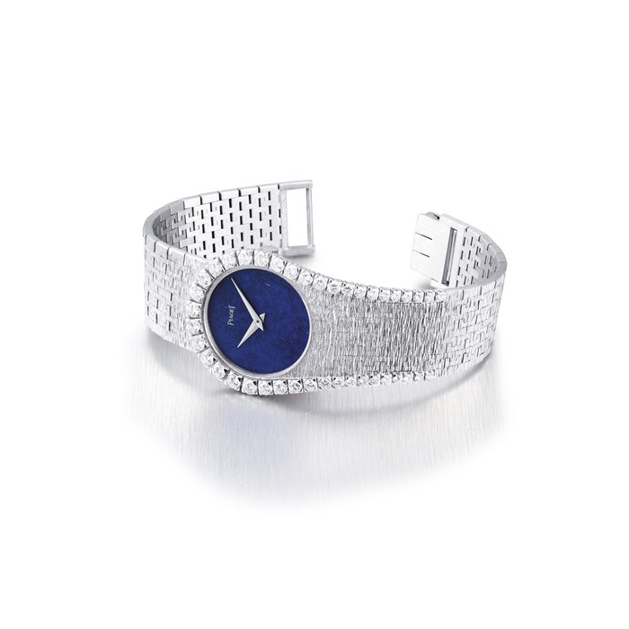 PIAGET. A LADY'S FINE 18K WHITE GOLD AND DIAMOND-SET BRACELET WATCH WITH LAPIS LAZULI DIAL SIGNED PIAGET, REF. 9181 A6, CASE NO. 295'460, CIRCA 1970