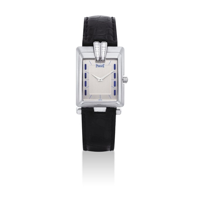 PIAGET. A FINE 18K WHITE GOLD, DIAMOND AND LAPIS LAZULI-SET RECTANGULAR WRISTWATCH SIGNED PIAGET, CASE NOS. 91'102 AND 800'116, CIRCA 1995
