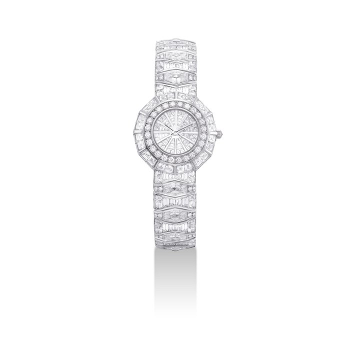 CORUM. A LADY'S IMPRESSIVE AND FINE PLATINUM AND DIAMOND-SET DODECAGON-SHAPED BRACELET WATCH SIGNED CORUM, LIMELIGHT MODEL, REF. 64.995.79 M45, CASE NO. 610'276, CIRCA 1997