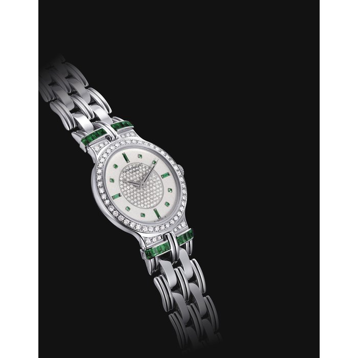 PATEK PHILIPPE. A FINE AND RARE 18K WHITE GOLD, DIAMOND AND EMERALD-SET BRACELET WATCH WITH ORIGINAL CERTIFICATE SIGNED PATEK PHILIPPE, GENEVE, REF. 3964, MOVEMENT NO. 1'820'828, CASE NO. 2'895'930, CIRCA 1991