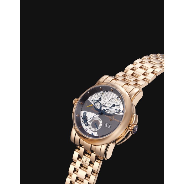 ULYSEE NARDIN. A FINE AND HEAVY 18K GOLD AUTOMATIC DUAL TIME WRISTWATCH WITH SWEEP CENTRE SECONDS, DATE, ALARM, COUNTDOWN FUNCTION AND BRACELET SIGNED ULYSSE NARDIN, SONATA CATHEDRAL DUAL TIME MODEL, REF. 676-88, MOVEMENT NO. 020'55, CASE NO. 262, CIRCA 2010