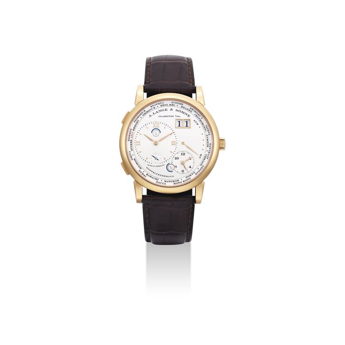 A. LANGE & SÖHNE. A VERY FINE AND RARE 18K PINK GOLD DUAL AND WORLD TIME WRISTWATCH WITH DATE, POWER RESERVE, DAY AND NIGHT INDICATION AND HACK FEATURE SIGNED A. LANGE & SÖHNE, GLASHÜTTE I/SA, LANGE 1 TIME ZONE MODEL, MOVEMENT NO. 55'504, CASE NO. 164'223, CIRCA 2005