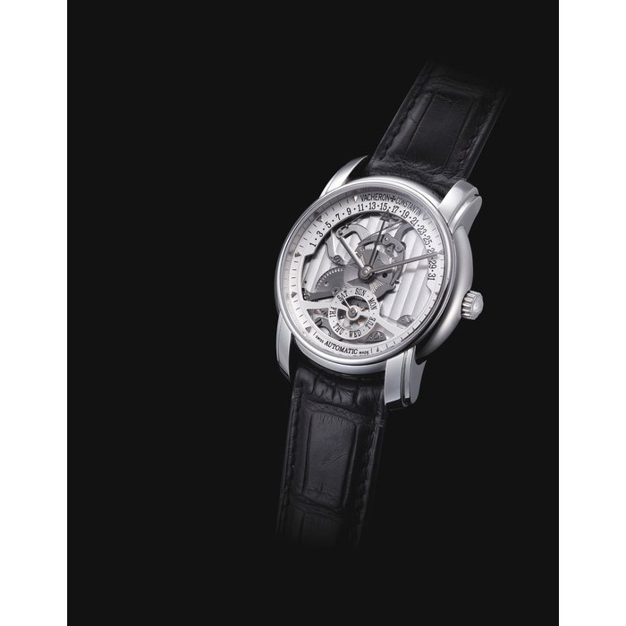 Vacheron Constantin VACHERON CONSTANTIN. A FINE AND RARE PLATINUM LIMITED EDITION AUTOMATIC SEMI-SKELETONISED WRISTWATCH WITH DAY AND RETROGRADE DATE, MADE TO COMMEMORATE THE 247TH ANNIVERSARY OF VACHERON CONSTANTIN SIGNED VACHERON CONSTANTIN, GENEVE, PATRIMONY RETROGRADE MODEL, NO. 245/247, REF. 47245, MOVEMENT NO. 887'422, CASE NO. 738'581, CIRCA 2002
