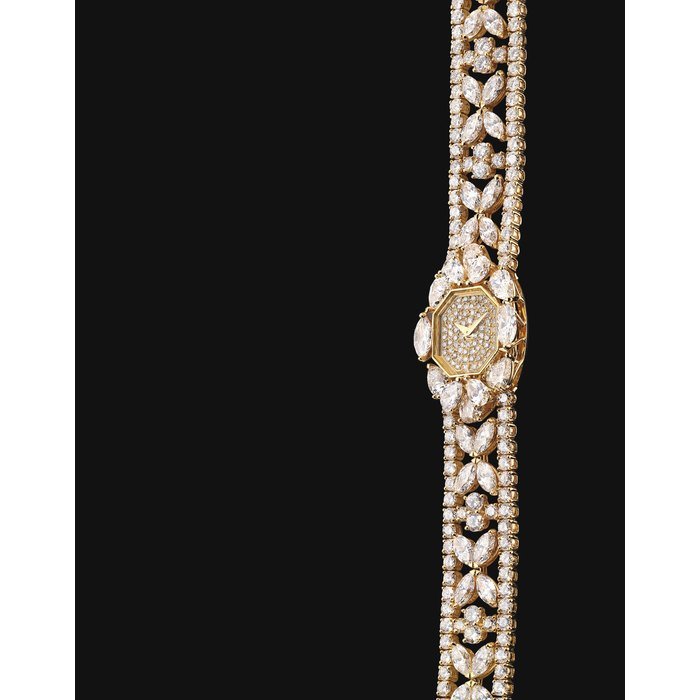 French FRENCH. A LADY'S FINE 18K GOLD AND DIAMOND-SET OCTAGONAL BRACELET WATCH MOVEMENT SIGNED VACHERON CONSTANTIN, GENEVE, CASE NO. 571'917, CIRCA 1970
