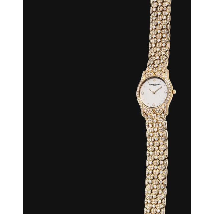 Vacheron Constantin VACHERON CONSTANTIN. A LADY'S FINE 18K GOLD AND DIAMOND-SET WRISTWATCH WITH BRACELET SIGNED VACHERON CONSTANTIN, GENEVE, CASE NO. 656'155, CIRCA 2000